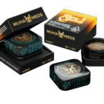 Muha meds honey banana hash rosin concentrate in glass jar with hybrid effects and tropical honey flavors