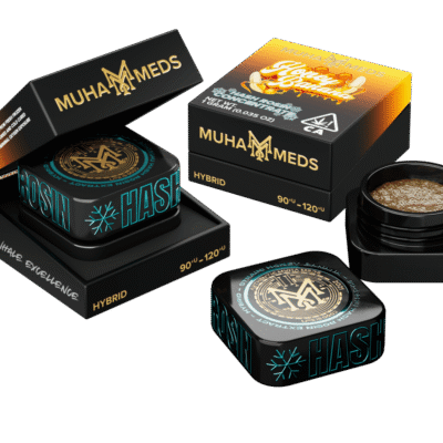 Muha meds honey banana hash rosin concentrate in glass jar with hybrid effects and tropical honey flavors