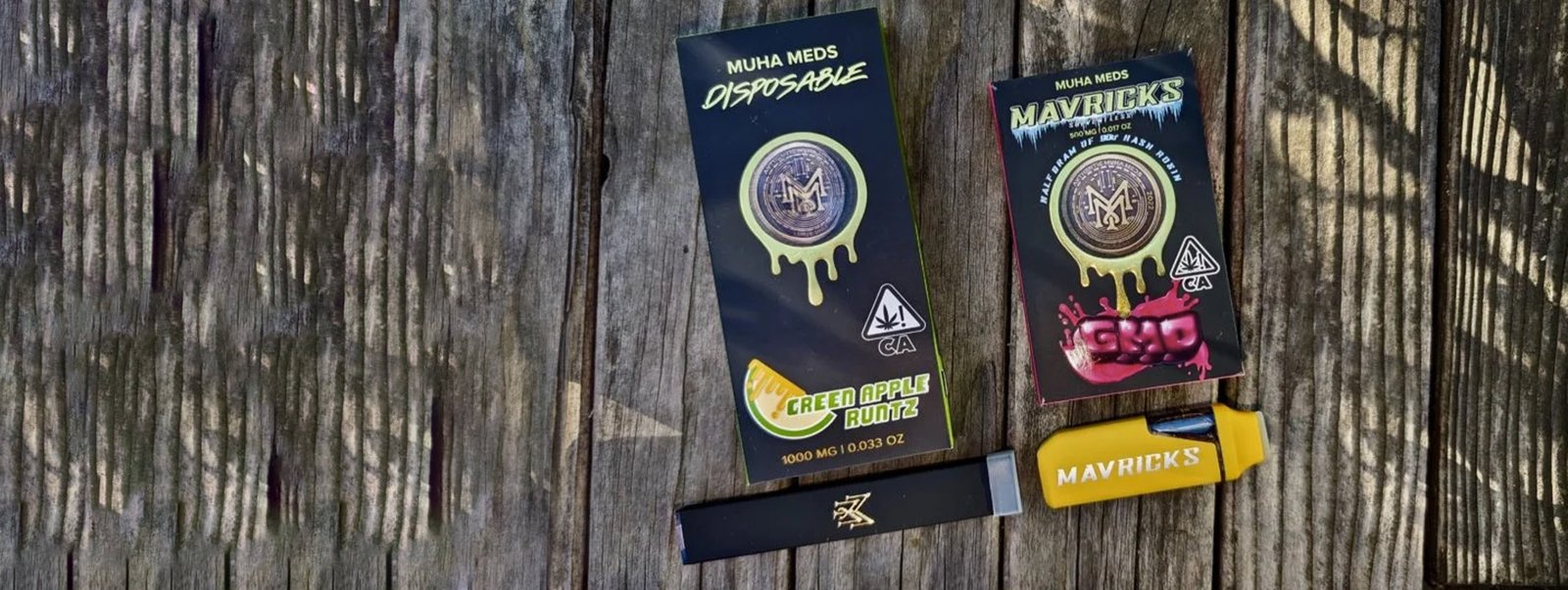 Muha Meds wholesale disposables and Mavricks packs laid out for a bulk order